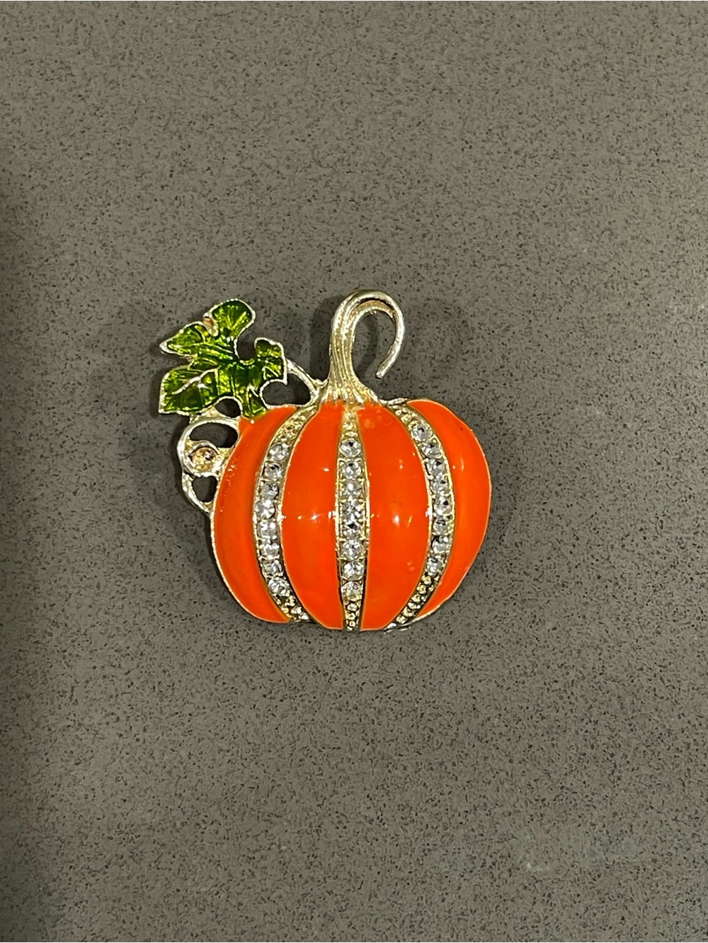 Orange Enamel Pumpkin brooch with Green Leaf and Crystal Stripes